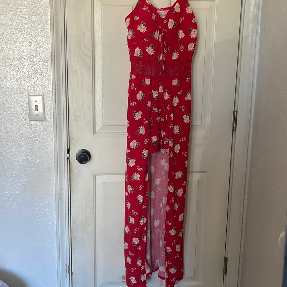 Cute shorts romper and long in the back.